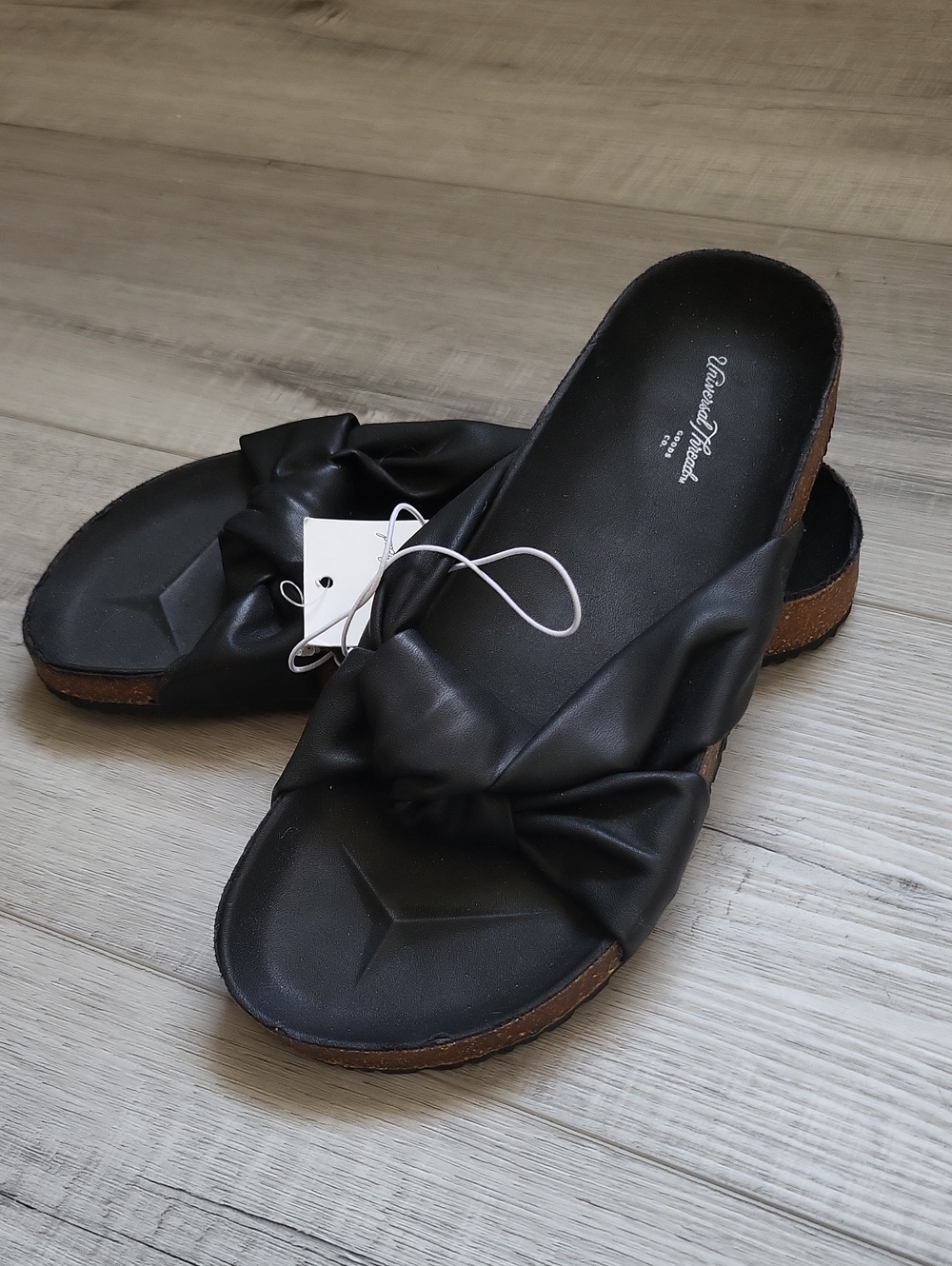 Black bow, cork bottom slip on sandals